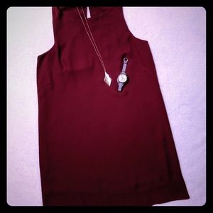 Simple red sheath dress.